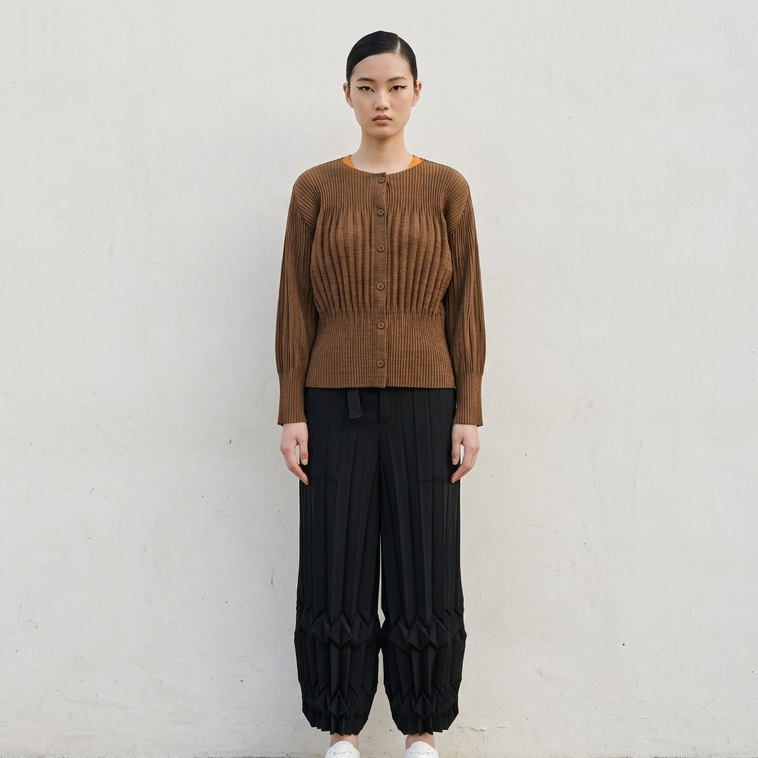 me Issey Miyake black pleated button-front cardigan with gathered waist and rounded sleeves - lifestyle