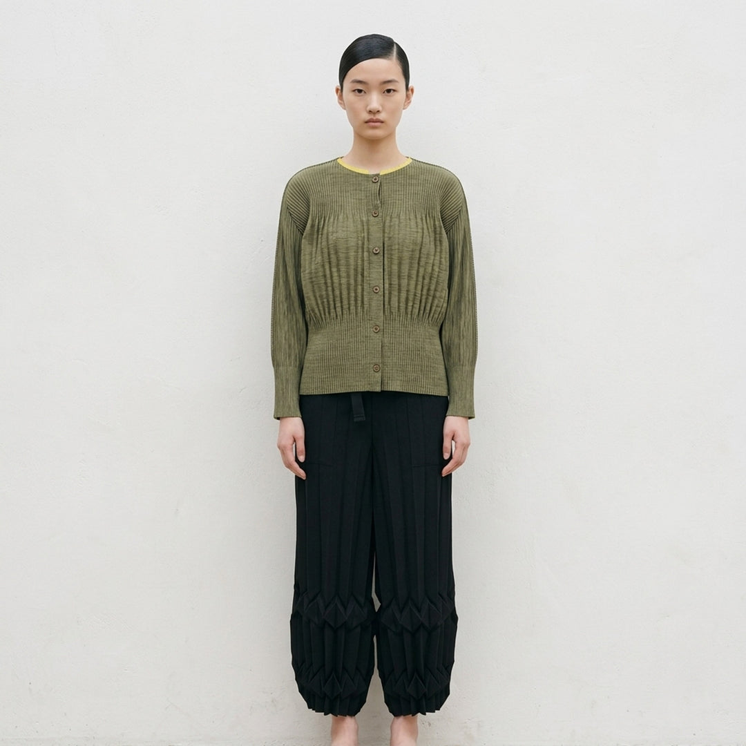 me Issey Miyake black pleated button-front cardigan with gathered waist and rounded sleeves - lifestyle