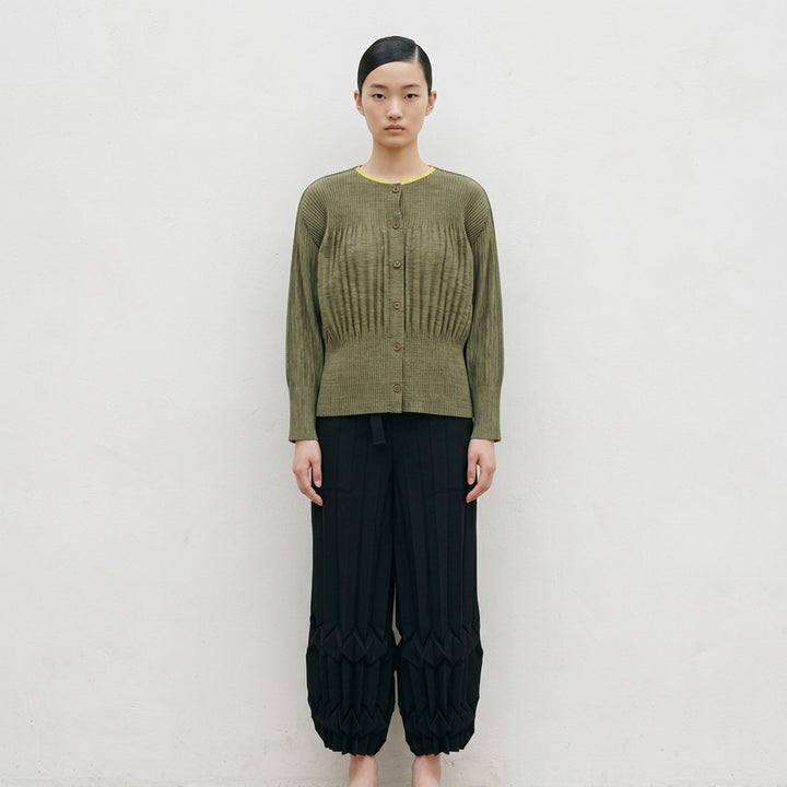 me Issey Miyake black pleated button-front cardigan with gathered waist and rounded sleeves - lifestyle