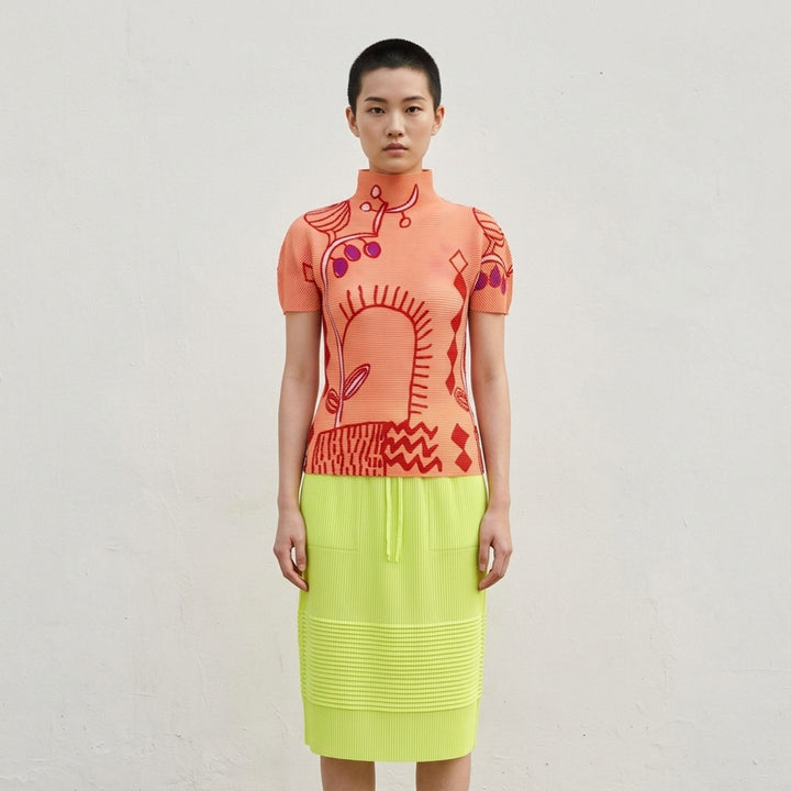 me Issey Miyake PLANT Short Sleeve Pleated Turtleneck Top in lavender grey with botanical and geometric all-over print featuring yellow accents, short puffed sleeves, and high neck - lifestyle