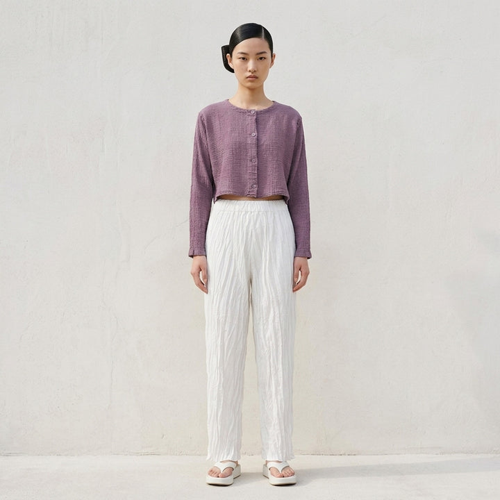 me Issey Miyake Polycotton Crepe cropped cardigan in dusty lilac with crinkled texture, round neckline and tonal button front - lifestyle