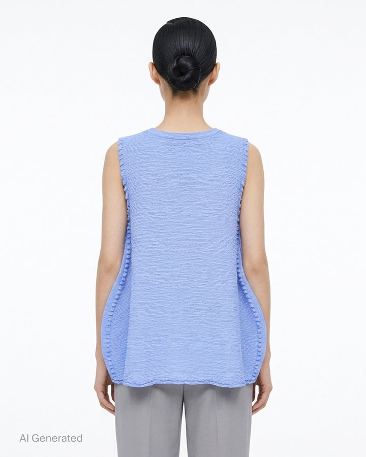 me Issey Miyake sleeveless tunic in textured polycotton crepe with ruffled centre-front seam and round neckline - back