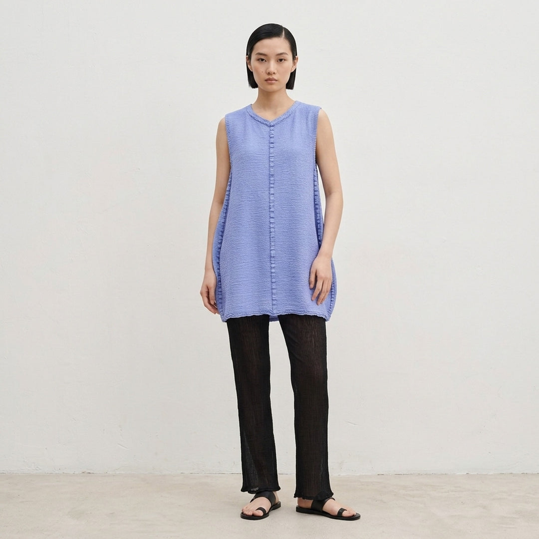 me Issey Miyake sleeveless tunic in textured polycotton crepe with ruffled centre-front seam and round neckline - lifestyle