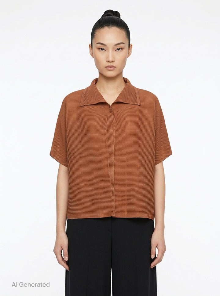 me Issey Miyake Square Stretch Pleats cardigan in black, featuring a boxy silhouette, spread collar, square micro-pleated texture, short sleeves, and single button front closure - front
