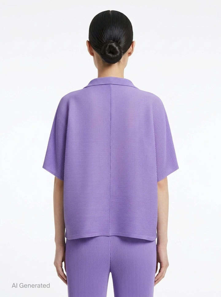 me Issey Miyake Square Stretch Pleats cardigan in black, featuring a boxy silhouette, spread collar, square micro-pleated texture, short sleeves, and single button front closure - back