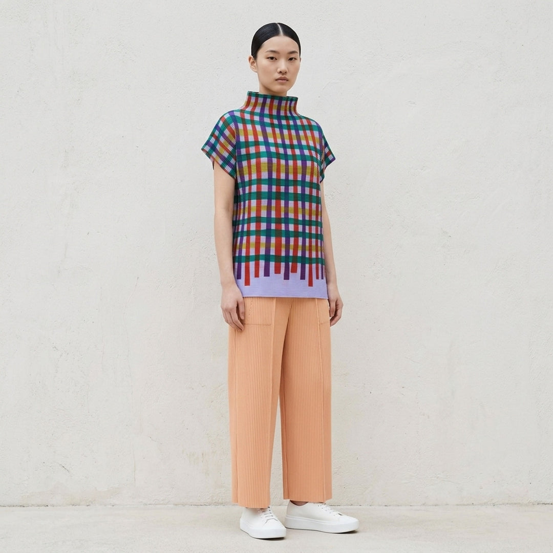 me Issey Miyake Tape Check pleated short-sleeve top with funnel neck and multicolour check print in red, purple, green, yellow and lilac - lifestyle