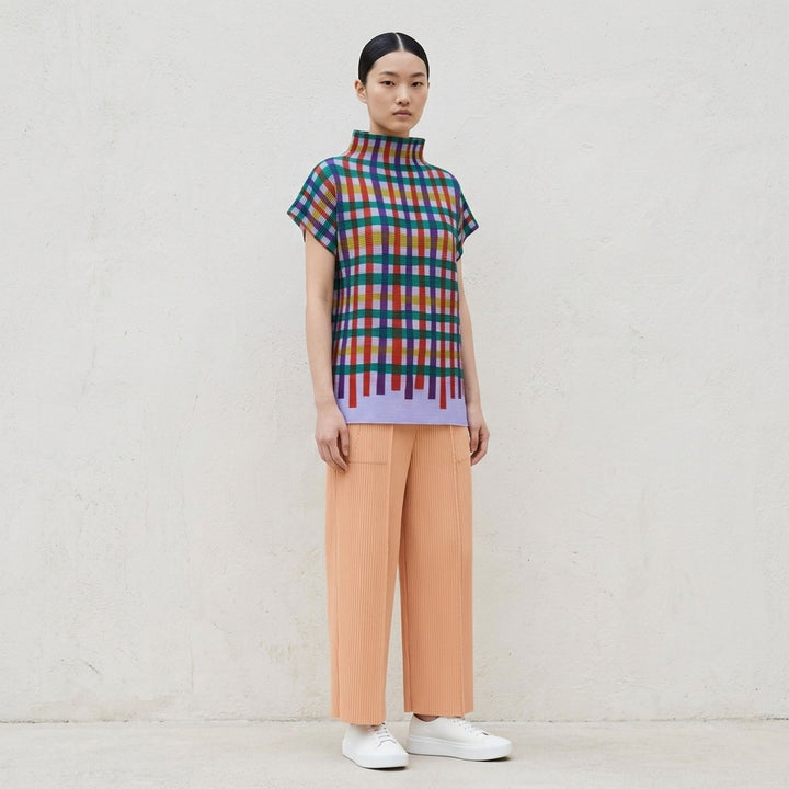 me Issey Miyake Tape Check pleated short-sleeve top with funnel neck and multicolour check print in red, purple, green, yellow and lilac - lifestyle