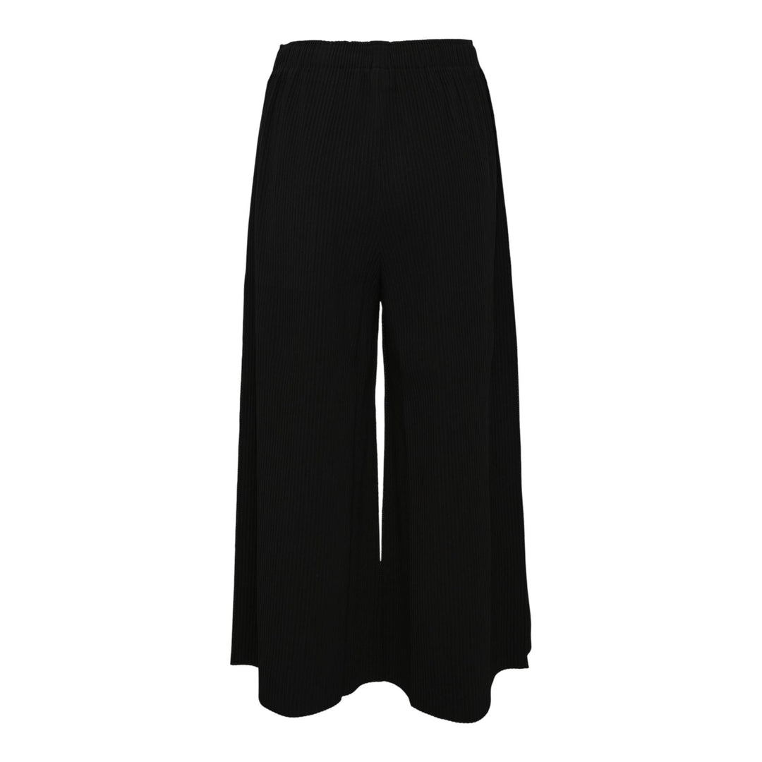Club21 - me ISSEY MIYAKE - Fine Knit Pleats Blk Wid Pants - PLEATED PANTS - Black