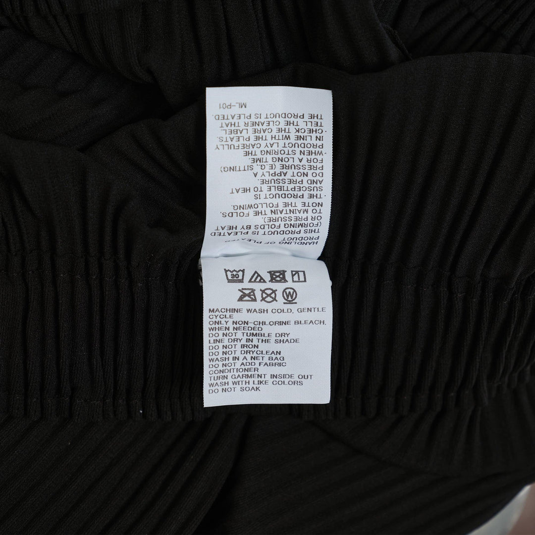 Club21 - me ISSEY MIYAKE - Fine Knit Pleats Blk Wid Pants - PLEATED PANTS - Black