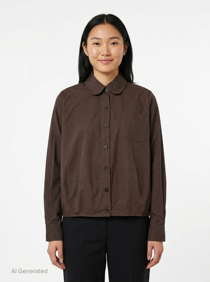 Melitta Baumeister Long Sleeve Cocoon Shirt in chocolate brown with rounded collar, contrast topstitching, chest patch pocket, and gathered elasticated hem band - front