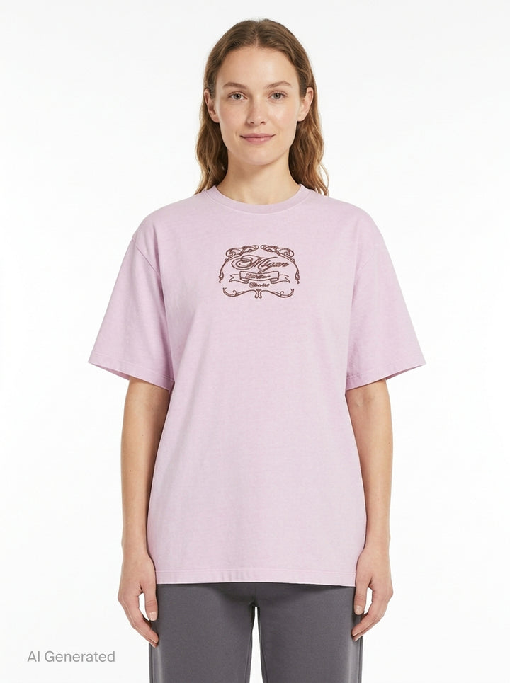 MSGM Insignia Print Tee in soft lilac with ornate crest graphic at the chest, oversized fit with short sleeves and crew neckline - front