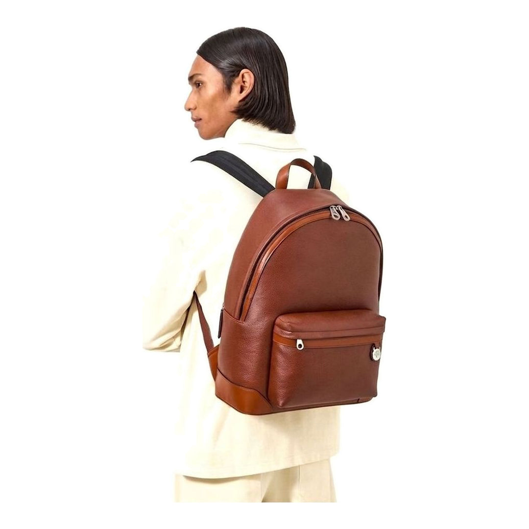 Mulberry Heritage Zipped Backpack in tan pebbled leather with silver-tone zip hardware, front zip pocket, and signature tree charm - packshot