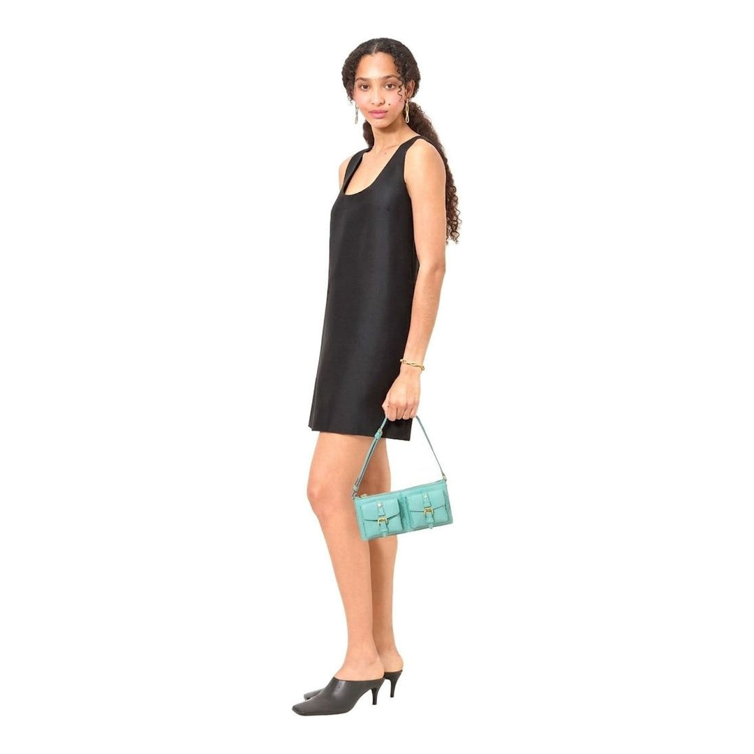 Mulberry Roxanne Mini Shoulder Bag in mint green pebbled leather, featuring two buckle-fastened front pockets, a zip top closure, and a slim adjustable shoulder strap with gold-tone hardware - packshot