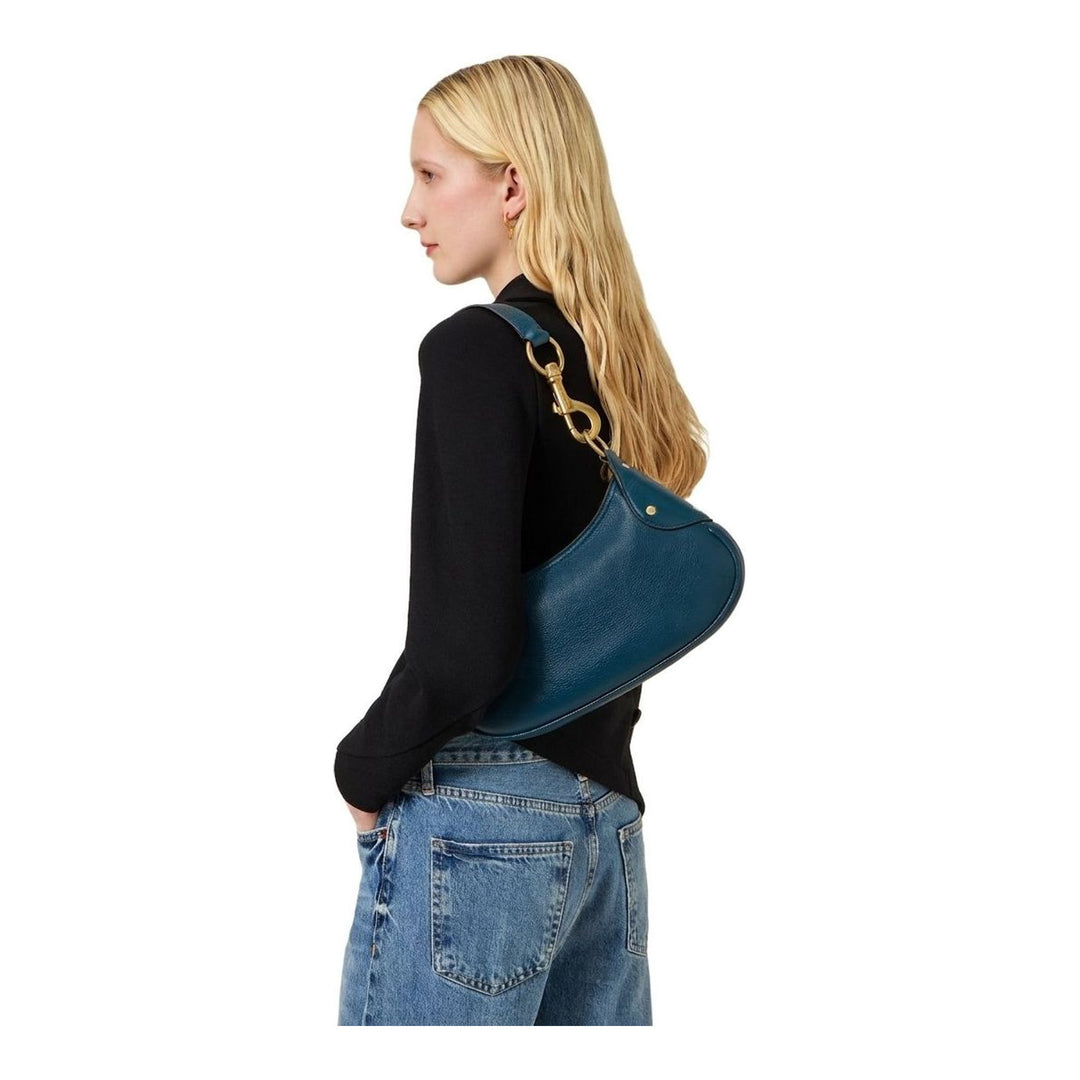 Mulberry Small Hackney Shoulder Bag in teal pebbled leather with an antique gold-tone bolt snap clasp on a single flat shoulder strap, curved crescent silhouette on a neutral background - packshot