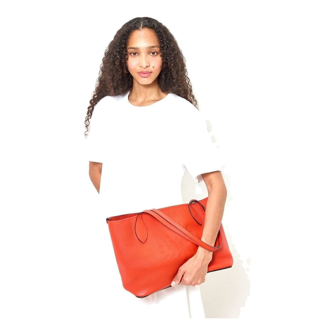Mulberry Tree Tote in orange-red heavy grain leather with debossed tree motif and twin flat shoulder straps, front view on white background - packshot