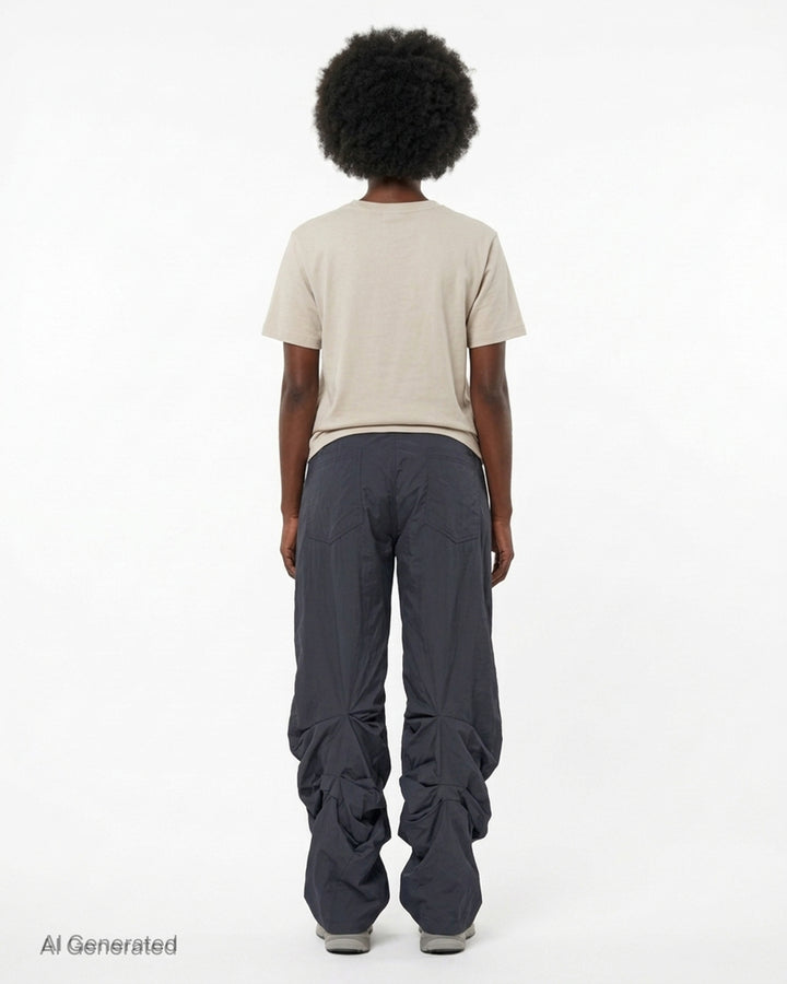Nache Pintuck Nylon Pants in navy with drawstring waist and wide leg with gathered, draped hems - back