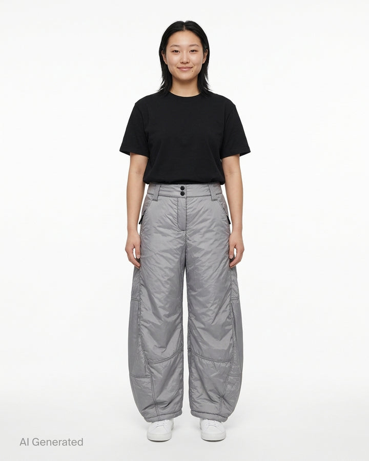 Open YY x Helinox grey padded pants with a quilted finish, barrel leg silhouette and zip pockets, shown from the front - front