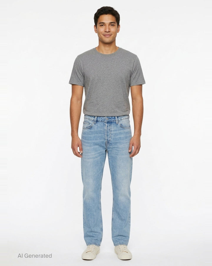 Our Legacy Slate Cut Jeans in light blue stonewash, relaxed straight-leg silhouette with five-pocket construction and vintage-style fading, front view on white background - front