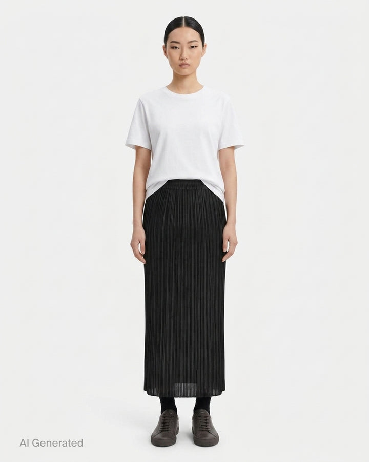 Back view of a black micro-pleated midi skirt by Pleats Please Issey Miyake with an elasticated waistband - front