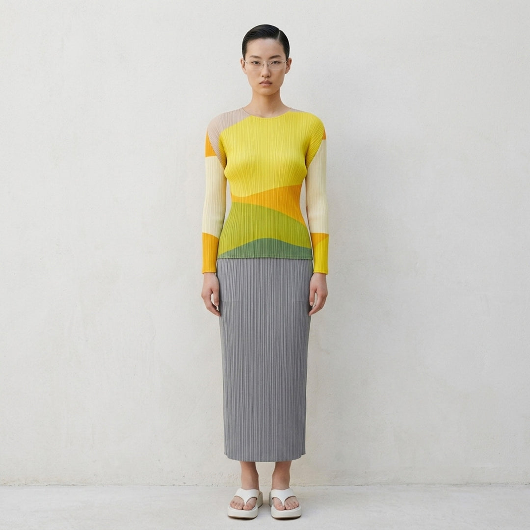 Back view of a black micro-pleated midi skirt by Pleats Please Issey Miyake with an elasticated waistband - lifestyle