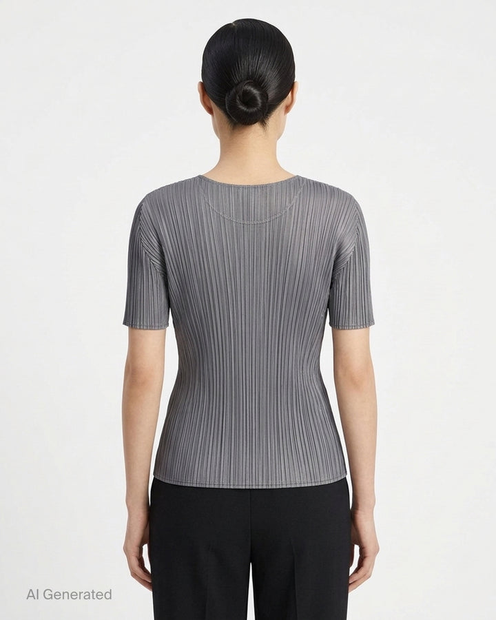 Pleats Please Issey Miyake black short sleeve pleated top with round neckline, front view - back
