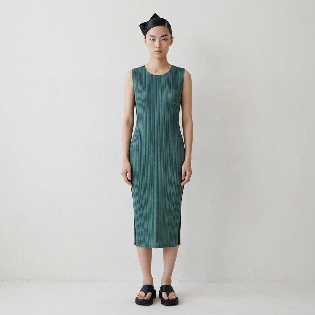 Pleats Please Issey Miyake sleeveless pleated midi dress in heathered deep teal with a round neckline and fitted silhouette - lifestyle