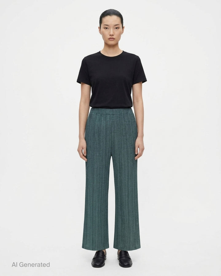 Pleats Please Issey Miyake Cotton Denim pleated wide-leg pants in textured teal-green, front view - front