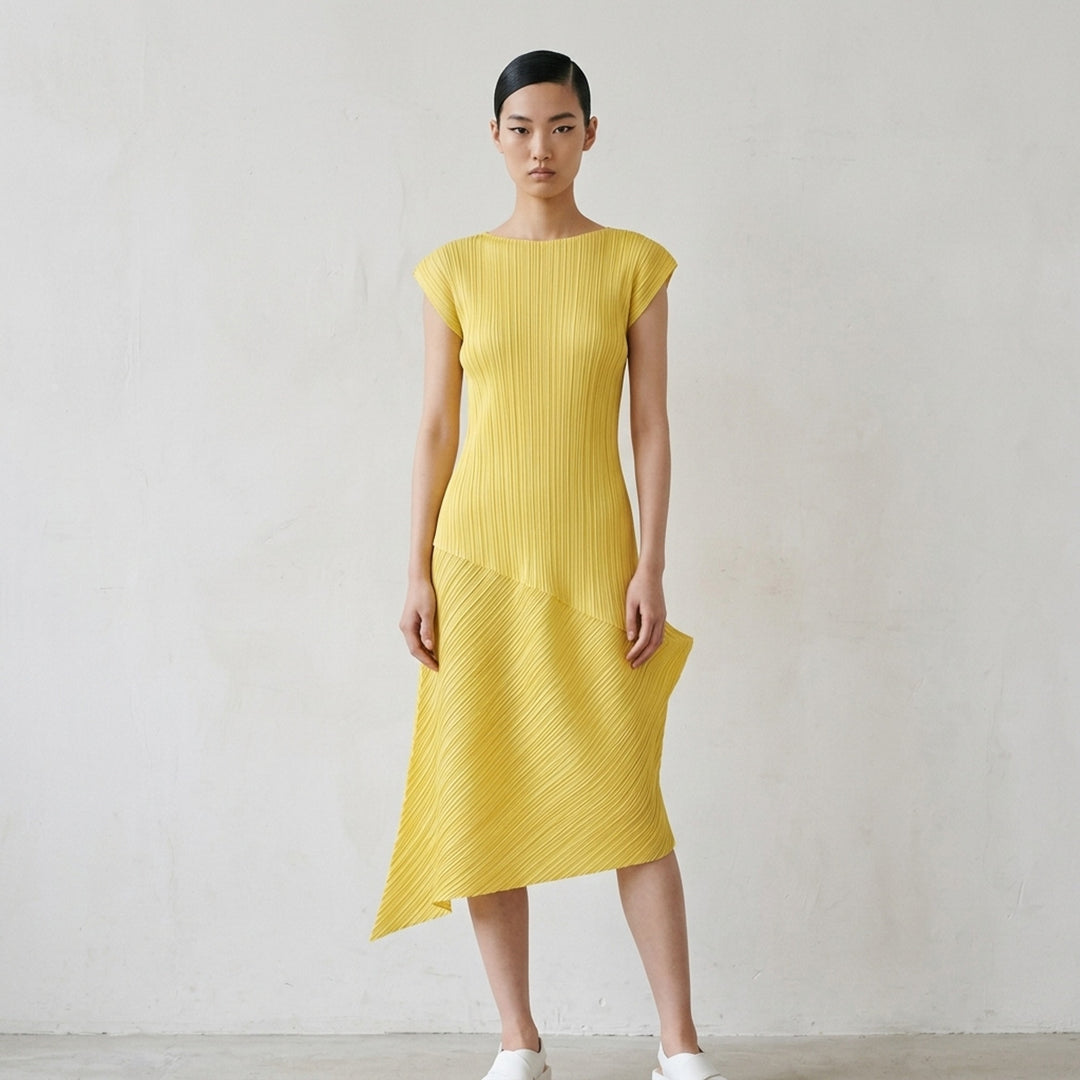 Black sleeveless pleated midi dress by Pleats Please Issey Miyake with vertical pleated bodice and asymmetric diagonal-pleated skirt - lifestyle