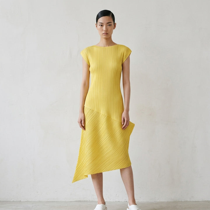 Black sleeveless pleated midi dress by Pleats Please Issey Miyake with vertical pleated bodice and asymmetric diagonal-pleated skirt - lifestyle