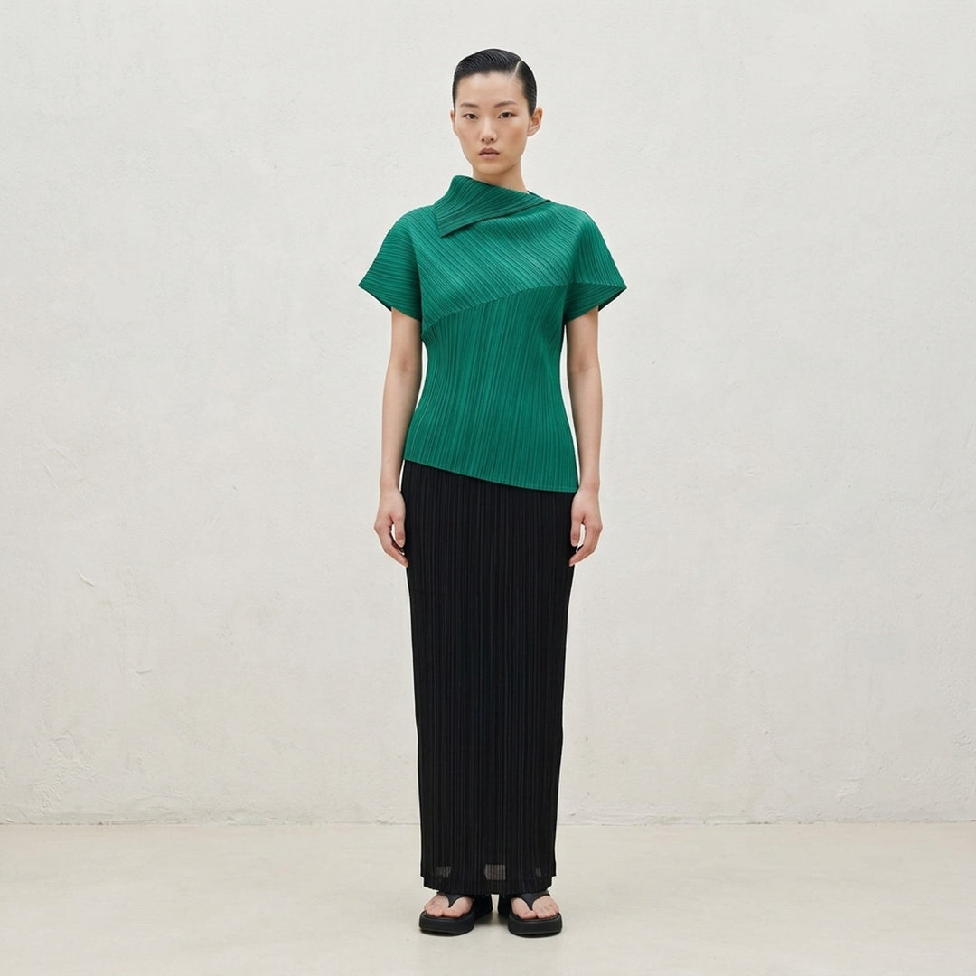 Emerald green LEAP pleated top by Pleats Please Issey Miyake with asymmetric folded collar and short sleeves - lifestyle