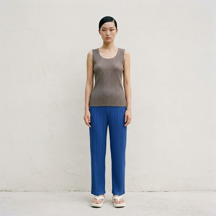 Pleats Please Issey Miyake Mist Basics Tank Top in heathered grey, featuring a fine-gauge semi-sheer ribbed knit, scoop neckline with dual-layer detail, and slim silhouette - lifestyle