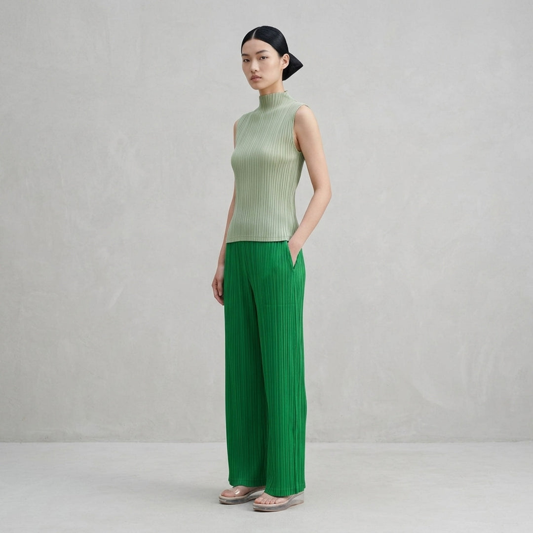 Pleats Please Issey Miyake Mist September sleeveless mock-neck top in sage green with fine vertical pleating and fitted silhouette - lifestyle