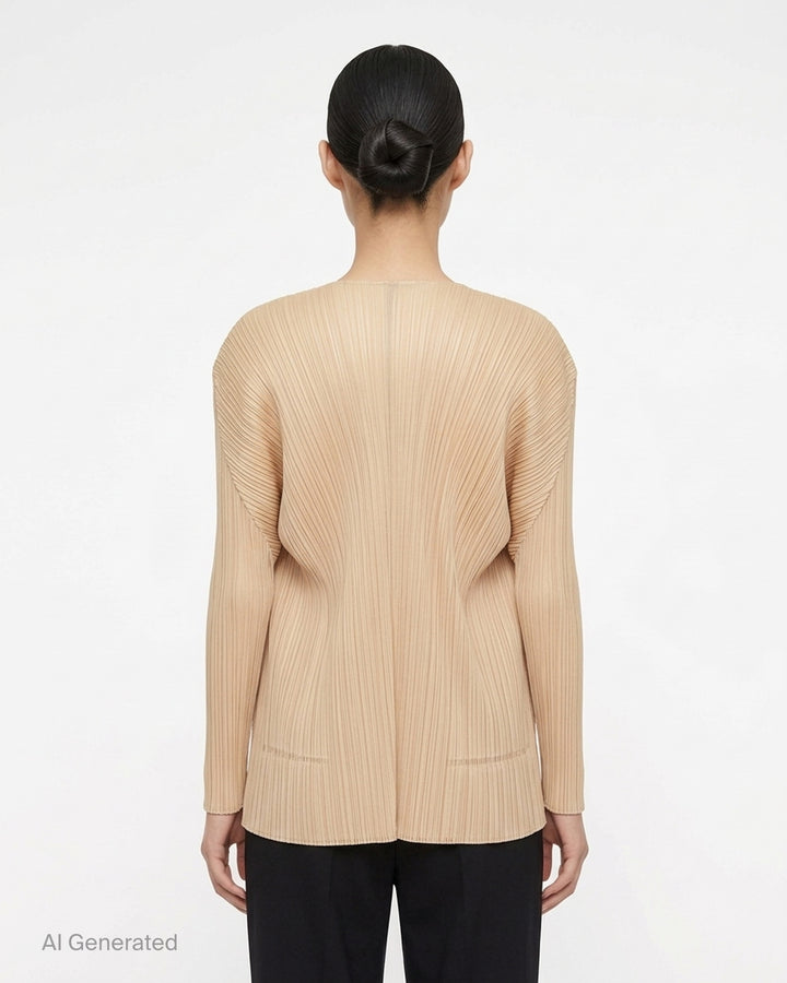 Back view of a sand-toned pleated long-sleeve cardigan from Pleats Please Issey Miyake with pleats fanning across the back - back