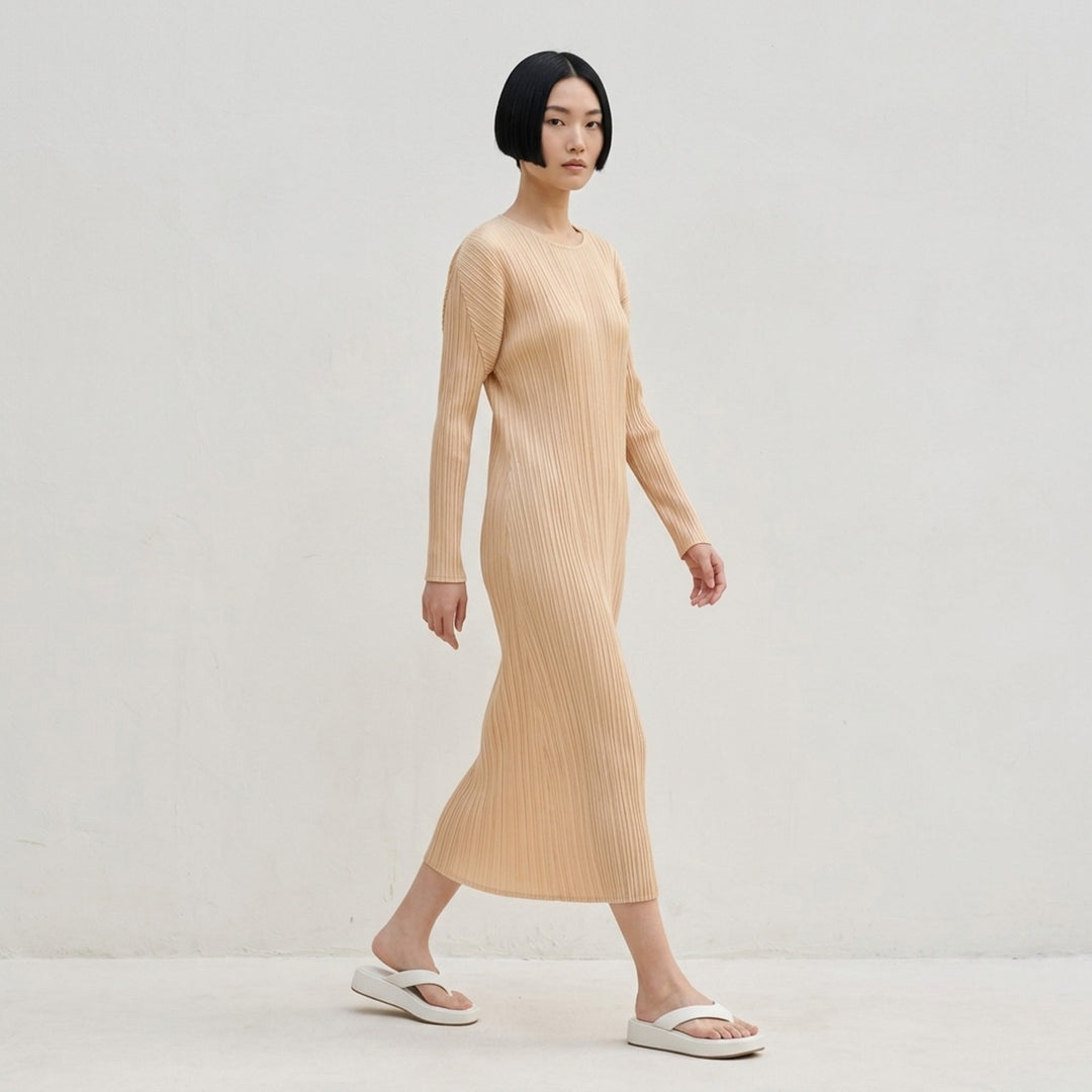 Pleats Please Issey Miyake Monthly Colors October long-sleeve pleated midi dress in sand - lifestyle