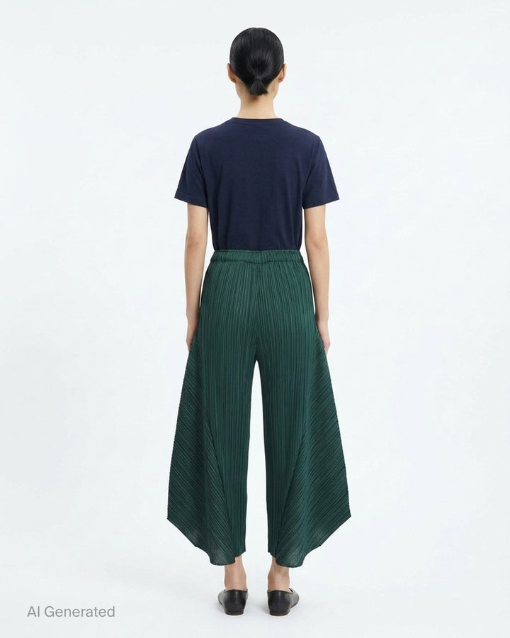 Pleats Please Issey Miyake Monthly Colors October pleated flared pants in deep green with sculpted side panels and elasticated waist - back