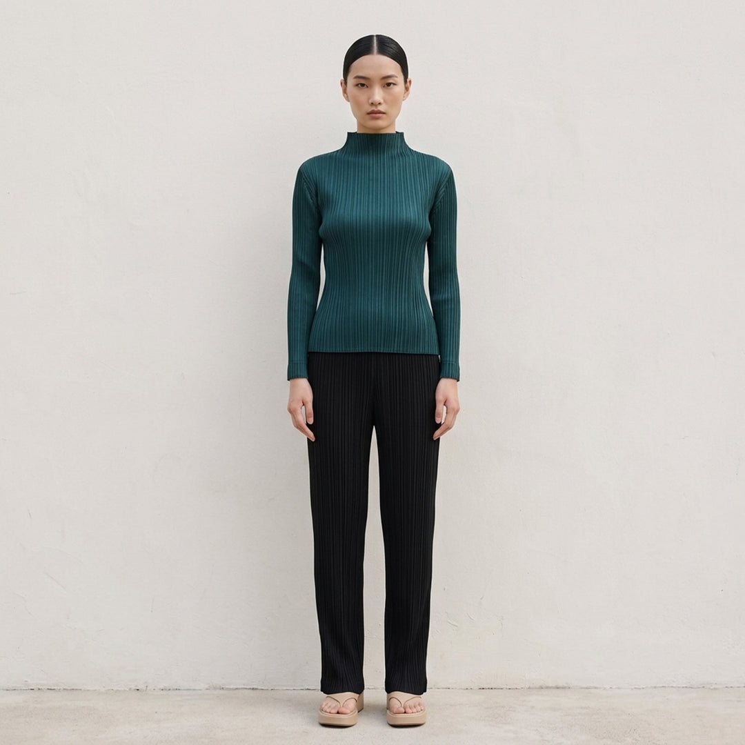 Pleats Please Issey Miyake Monthly Colors October long sleeve pleated mock neck top in deep green - lifestyle