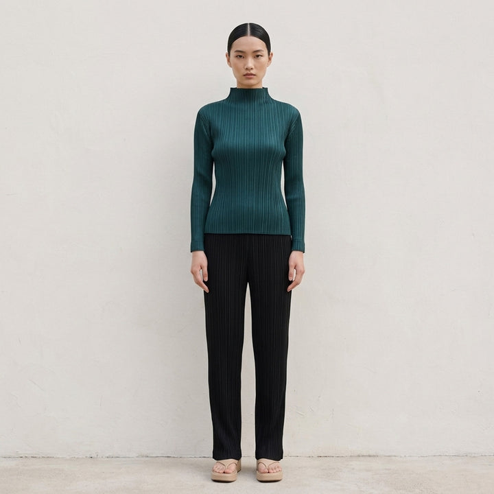 Pleats Please Issey Miyake Monthly Colors October long sleeve pleated mock neck top in deep green - lifestyle