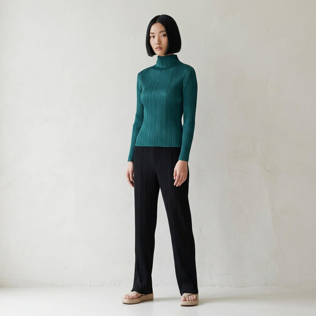 Pleats Please Issey Miyake Monthly Colors October long sleeve pleated mock neck top in deep green - lifestyle