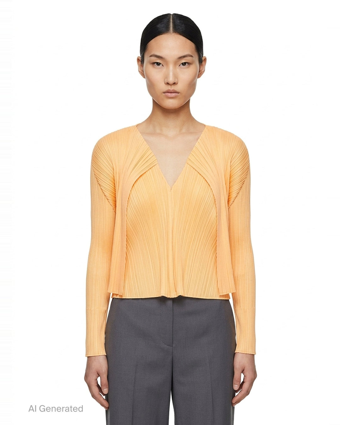 Pleats Please Issey Miyake Monthly Colors September black pleated open-front cardigan, back view, featuring radiating fan pleats from the yoke and long sleeves - front