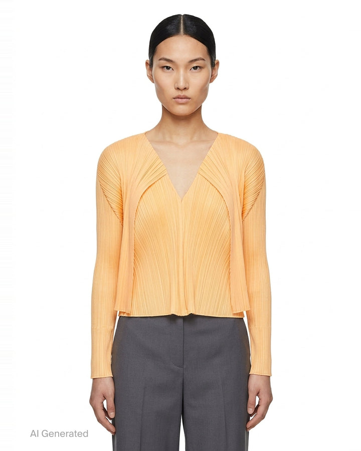 Pleats Please Issey Miyake Monthly Colors September black pleated open-front cardigan, back view, featuring radiating fan pleats from the yoke and long sleeves - front