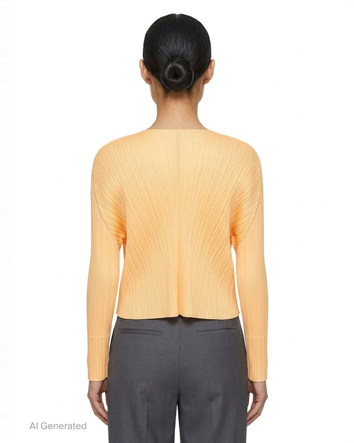 Pleats Please Issey Miyake Monthly Colors September black pleated open-front cardigan, back view, featuring radiating fan pleats from the yoke and long sleeves - back