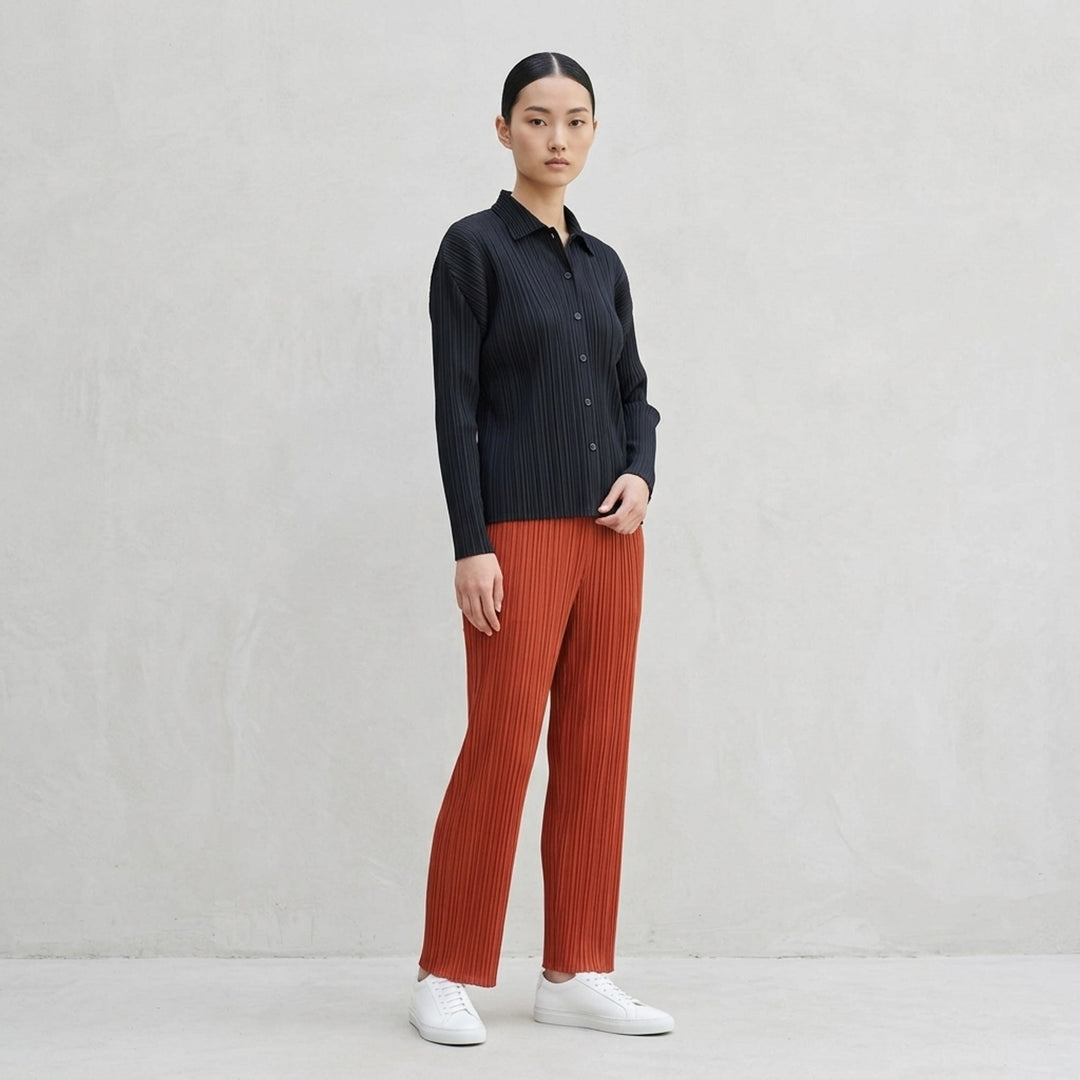 Pleats Please Issey Miyake Monthly Colors September black pleated straight-leg pants with elasticated waistband and all-over permanent pleating - lifestyle