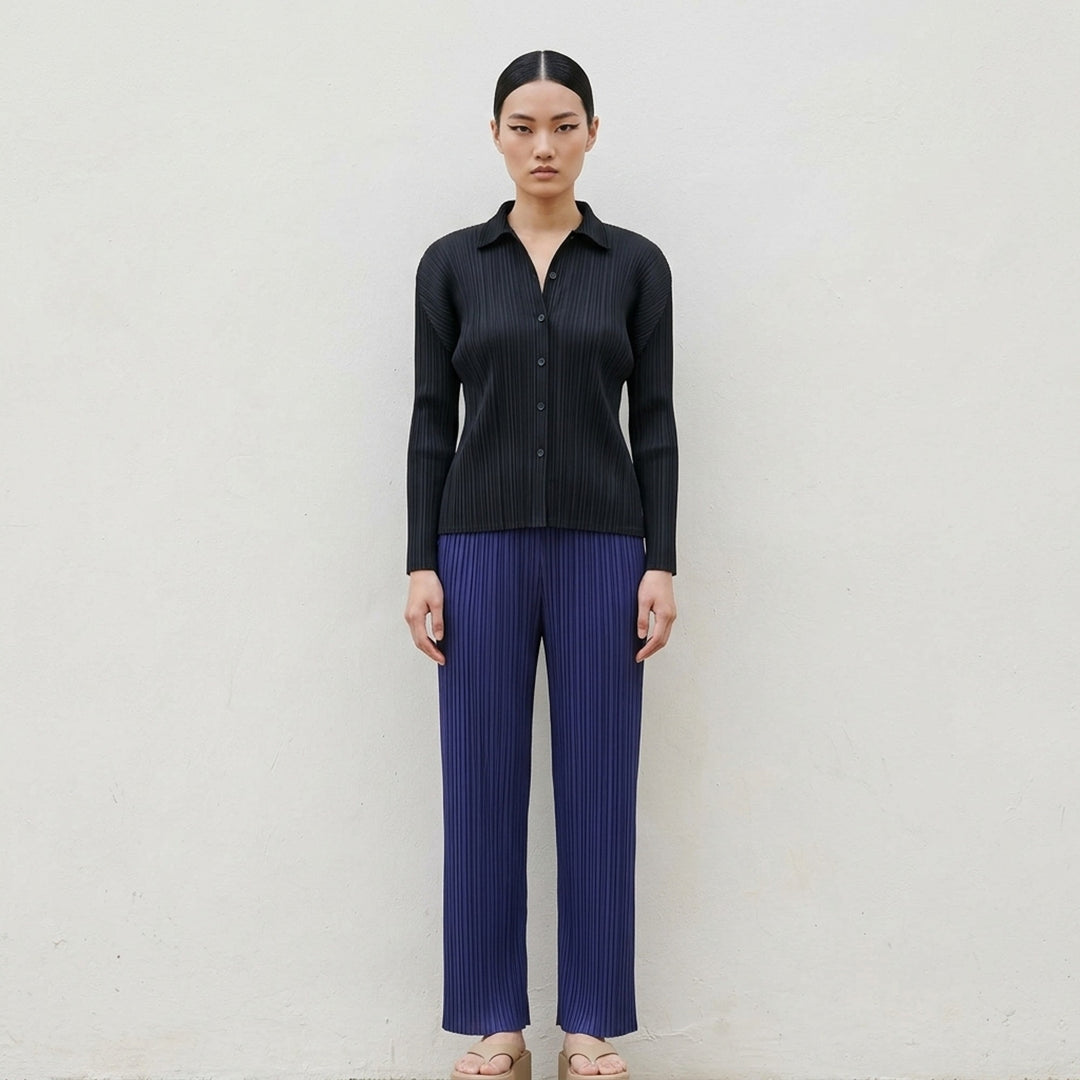 Pleats Please Issey Miyake Monthly Colors September black pleated straight-leg pants with elasticated waistband and all-over permanent pleating - lifestyle