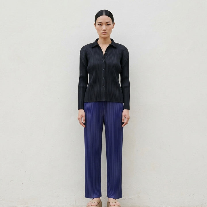 Pleats Please Issey Miyake Monthly Colors September black pleated straight-leg pants with elasticated waistband and all-over permanent pleating - lifestyle