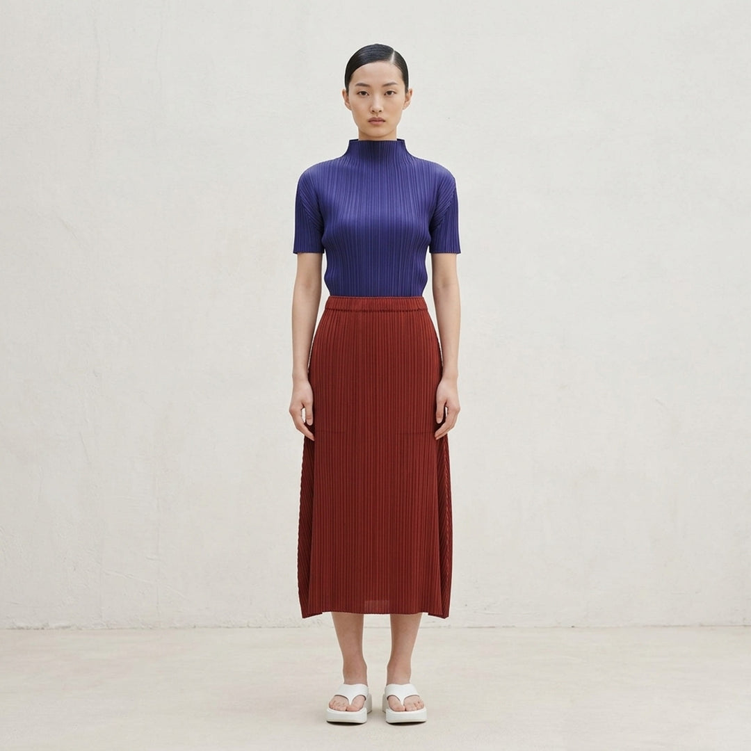 Pleats Please Issey Miyake Monthly Colors September short-sleeve mock-neck pleated top in rust - lifestyle