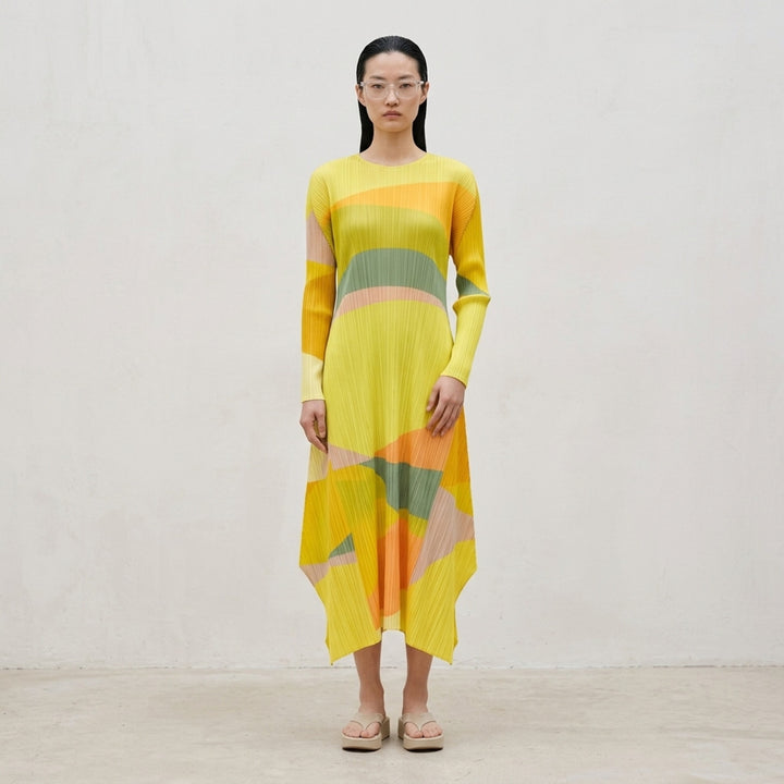 Pleats Please Issey Miyake Orbit long-sleeve pleated midi dress with abstract green, teal and navy colour-blocked print and asymmetric hem - lifestyle