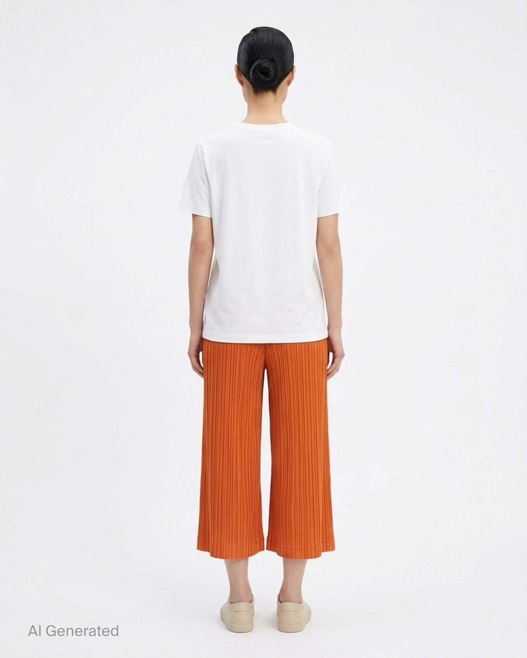 Pleats Please Issey Miyake Thicker Bottoms 2 wide-leg pleated culottes in charcoal with elasticated waistband and accordion micro-pleat construction - back