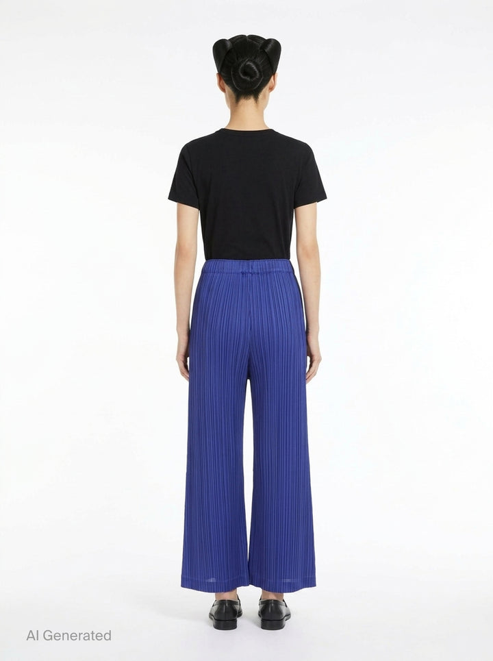 Pleats Please Issey Miyake Thicker Bottoms wide-leg pants in royal blue with all-over micro-pleating and elasticated waistband, shown from the back - back