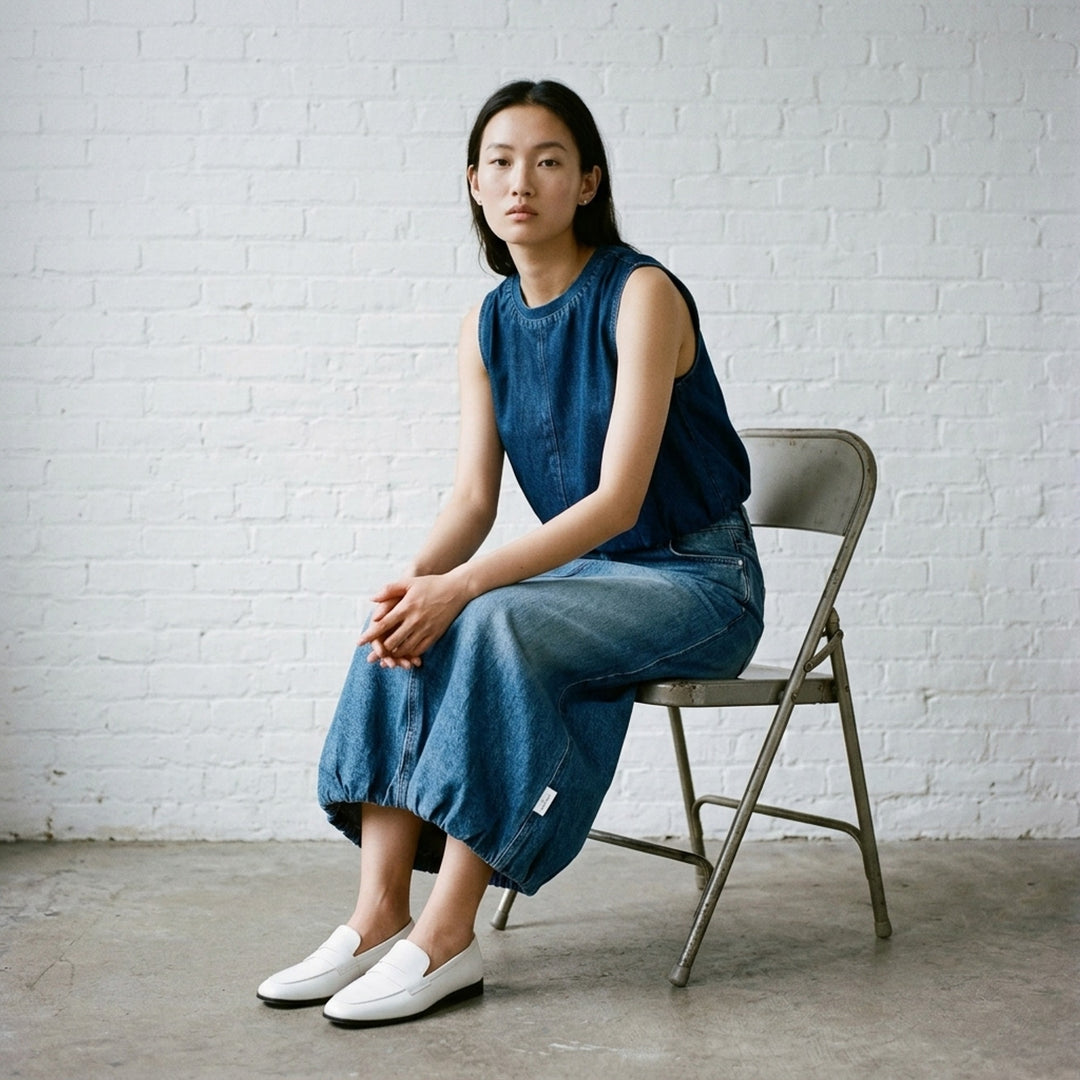 rag & bone Miramar Terry Bubble Skirt in light wash blue denim, featuring a front centre seam, bubble hem, and five-pocket construction - lifestyle