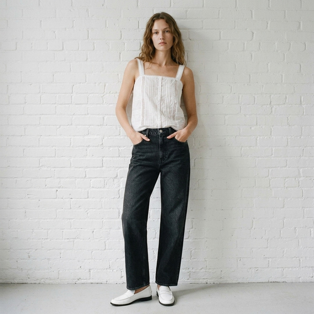 rag & bone Miramar Wide Leg Jeans in washed black denim with a high-rise waist, five-pocket styling, and silver-tone hardware, shown flat on a white background - lifestyle